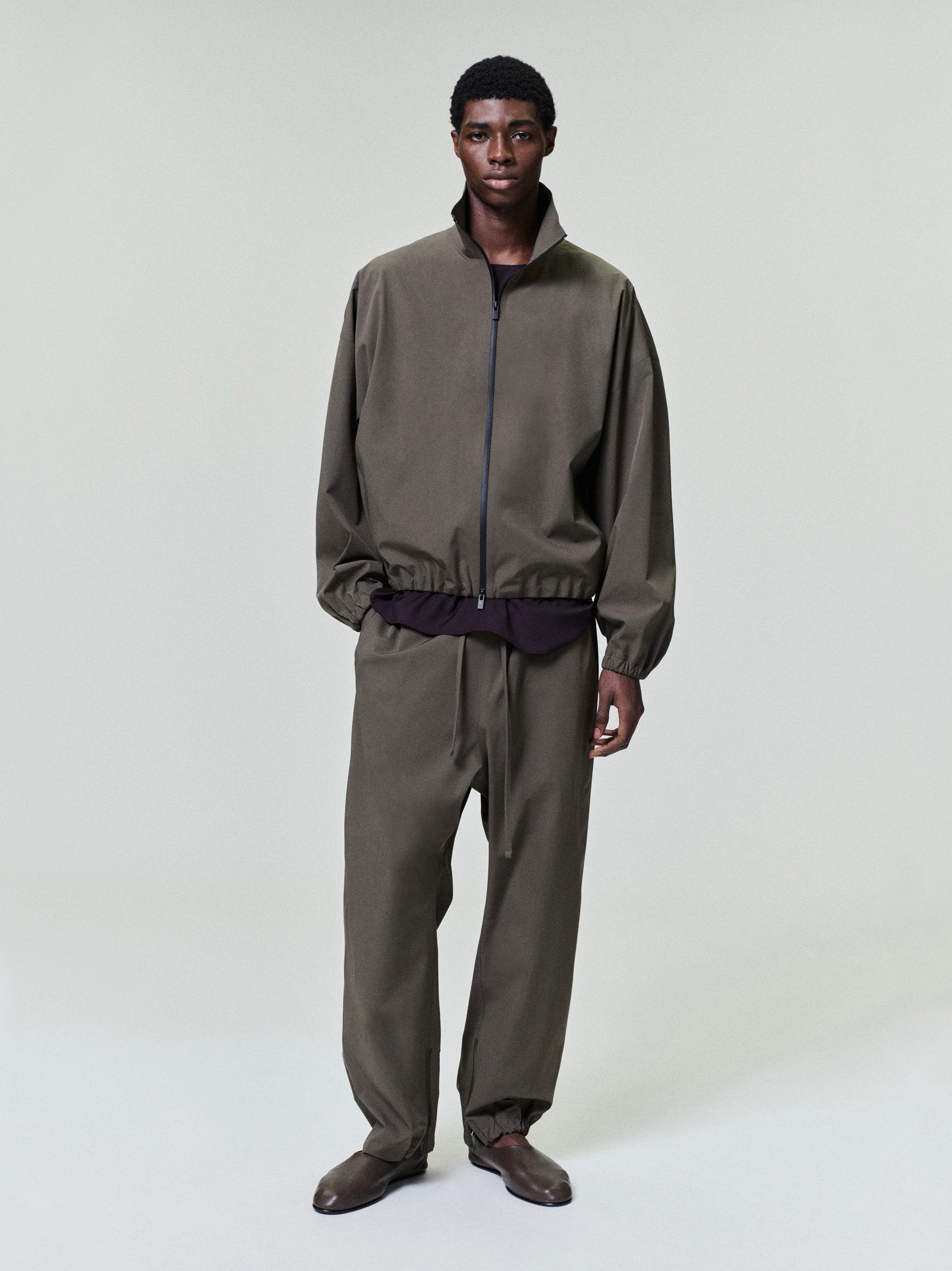 Оригінальна Bonded Nylon Tech Track Jacket Fear of god – боковий вид