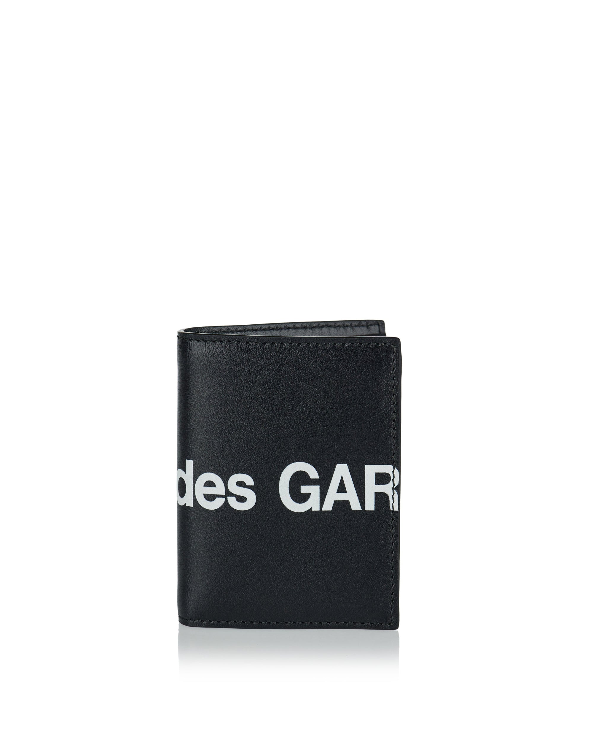 Large Logo Leather Bifold Wallet Comme des garcons оригінал – Купити в Україні – боковий вид