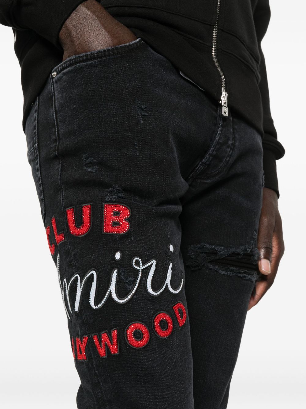 Embroidered Distressed Jeans Amiri – Гарантія оригінальності – вид ззаду