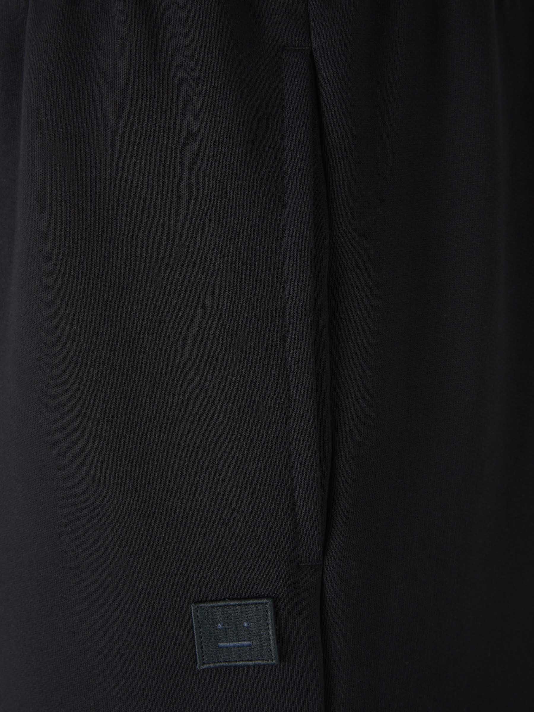 Оригінальна Joggers Parche Cara Acne studios – детальний вид