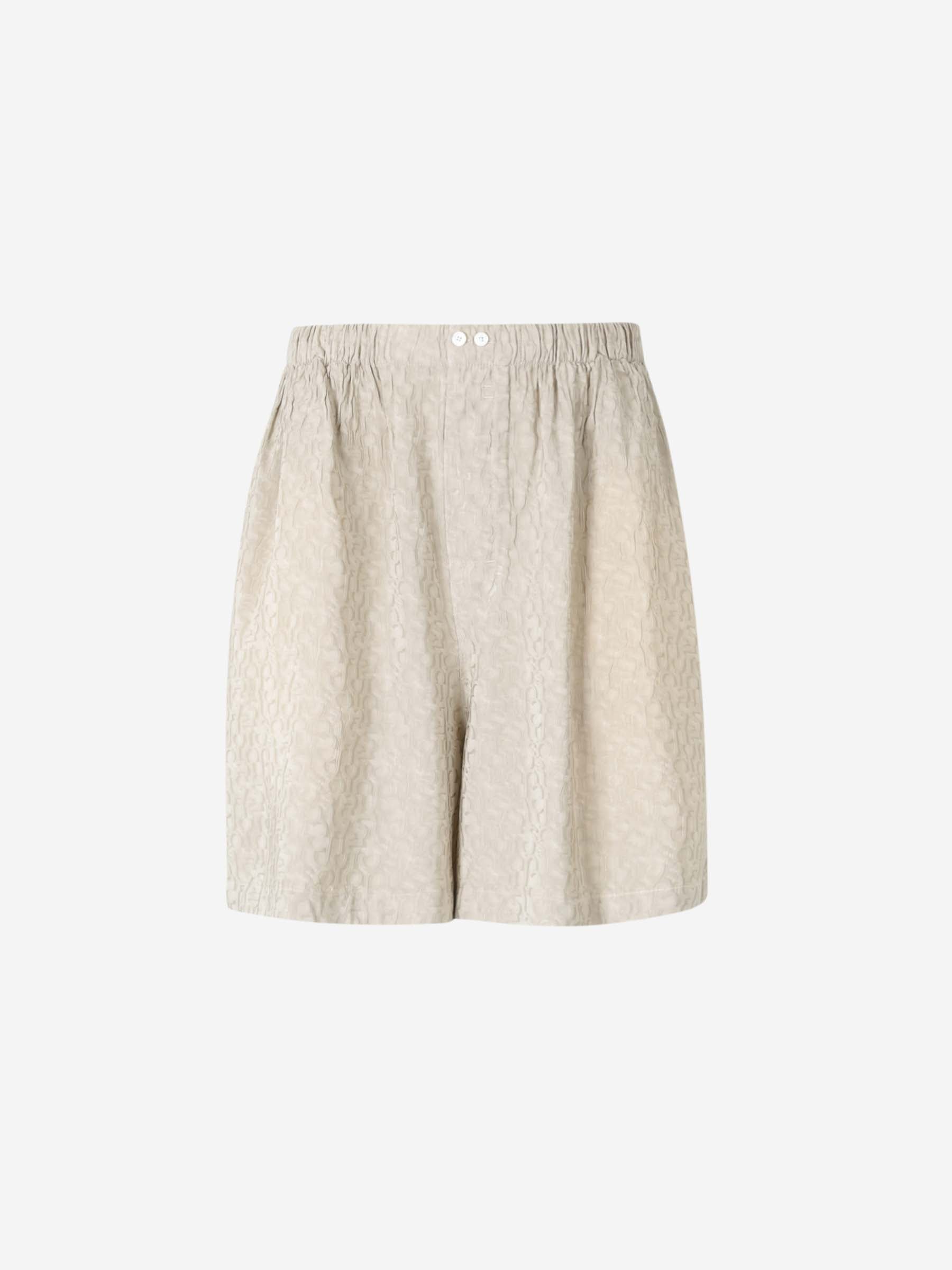 Monogram Bermuda Shorts Acne studios – Гарантія оригінальності – боковий вид