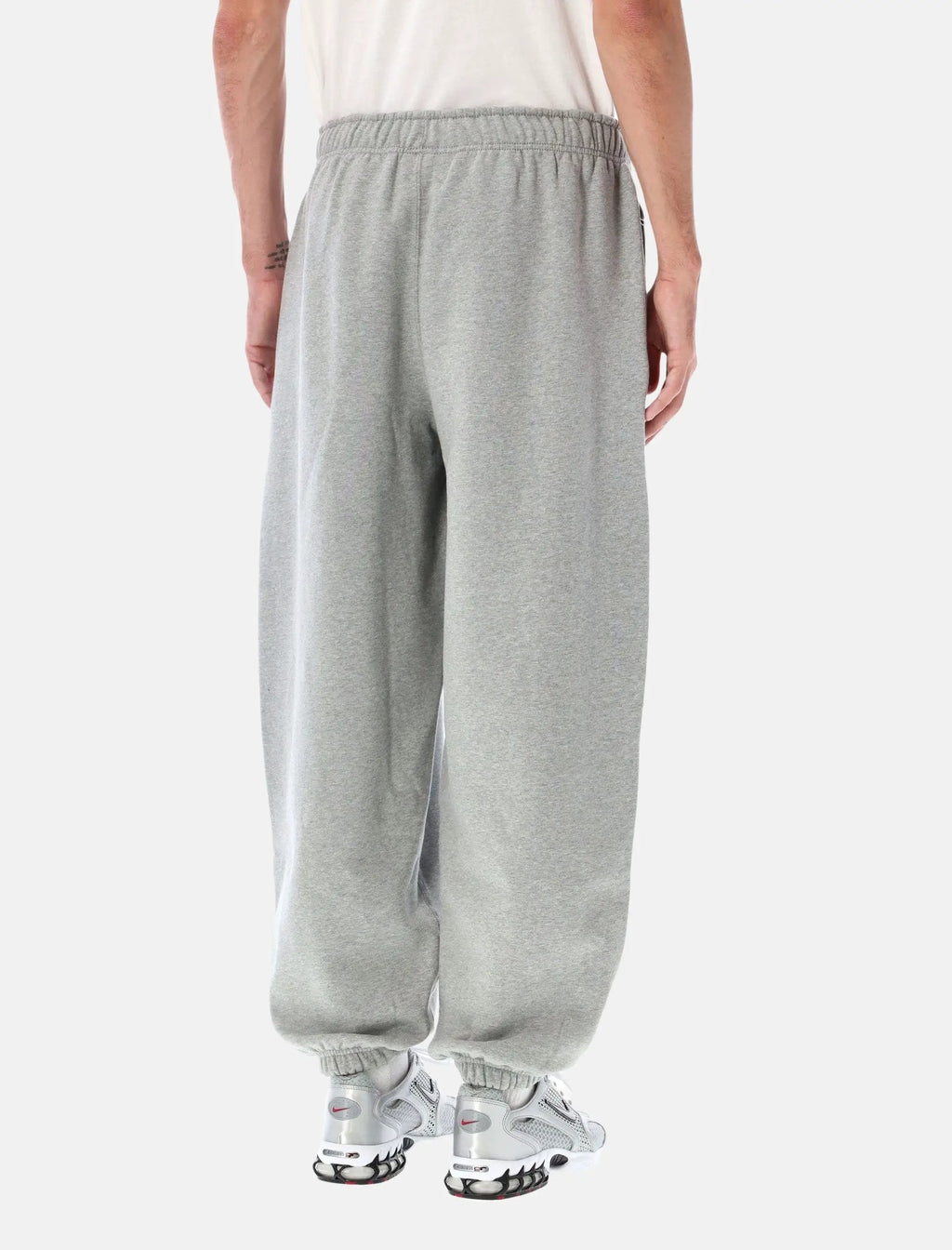 Оригінальна Solo Swoosh Fleece Pants Nike – вид ззаду