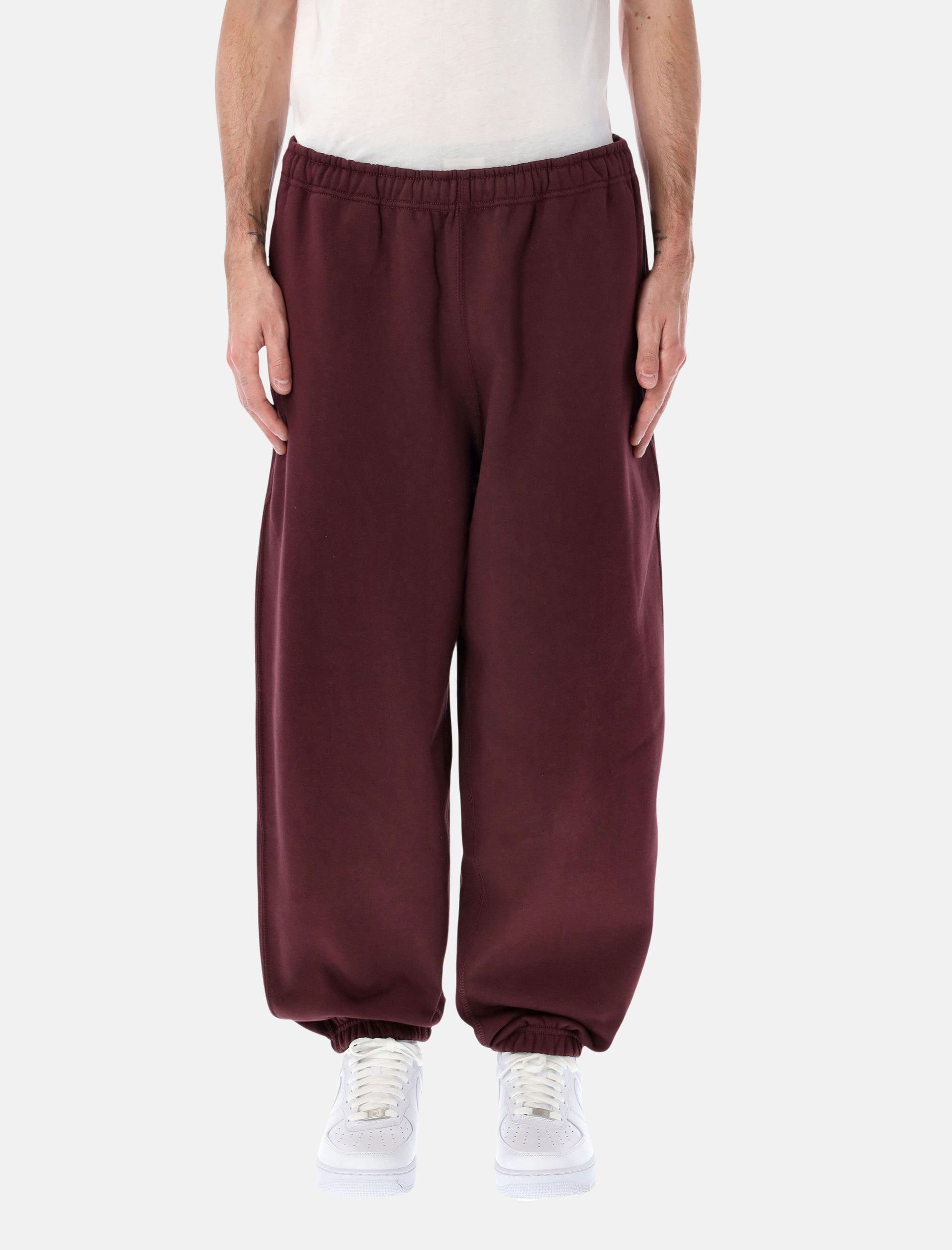 Оригінальна Solo Swoosh Fleece Pants Nike – боковий вид