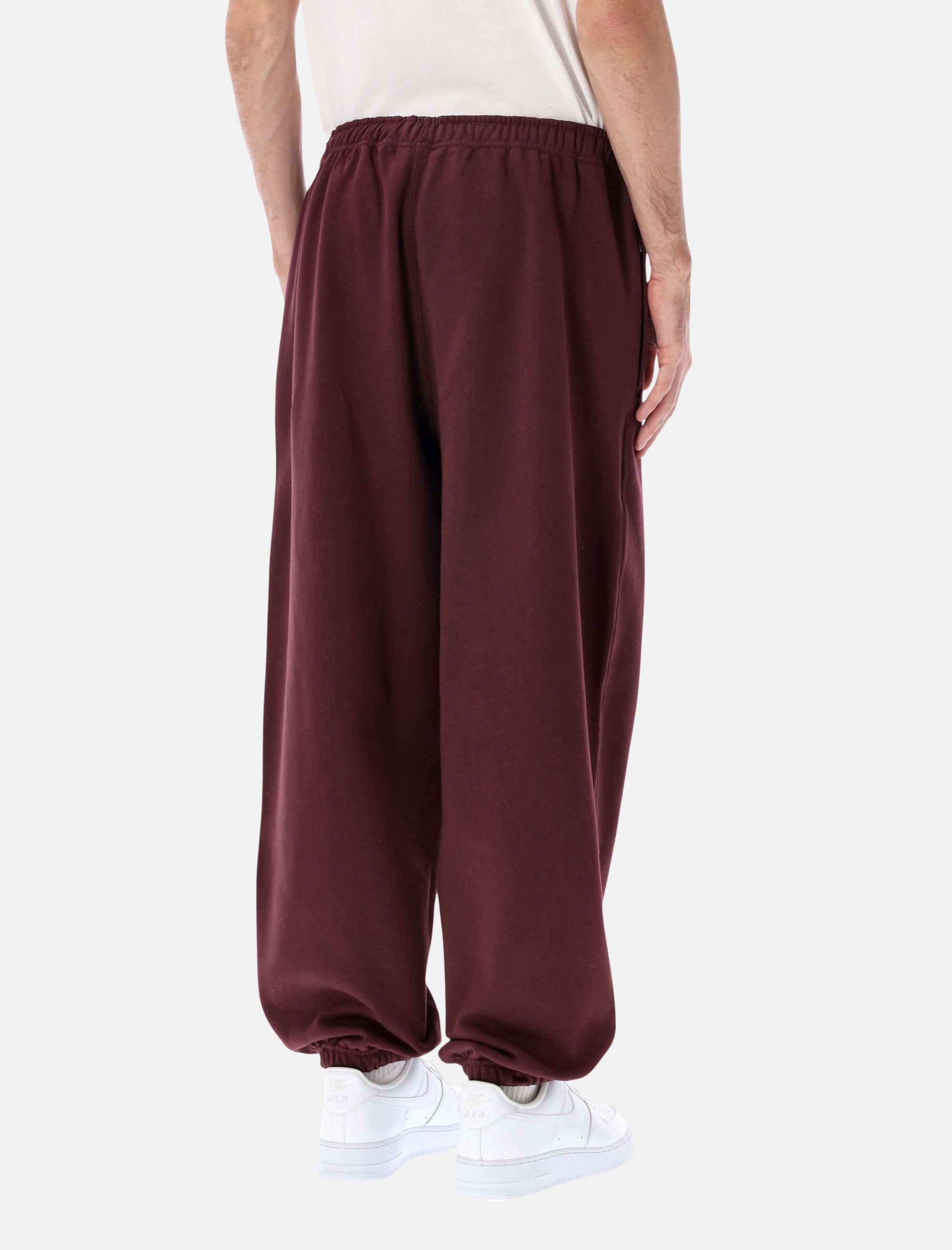 Оригінальна Solo Swoosh Fleece Pants Nike – вид ззаду
