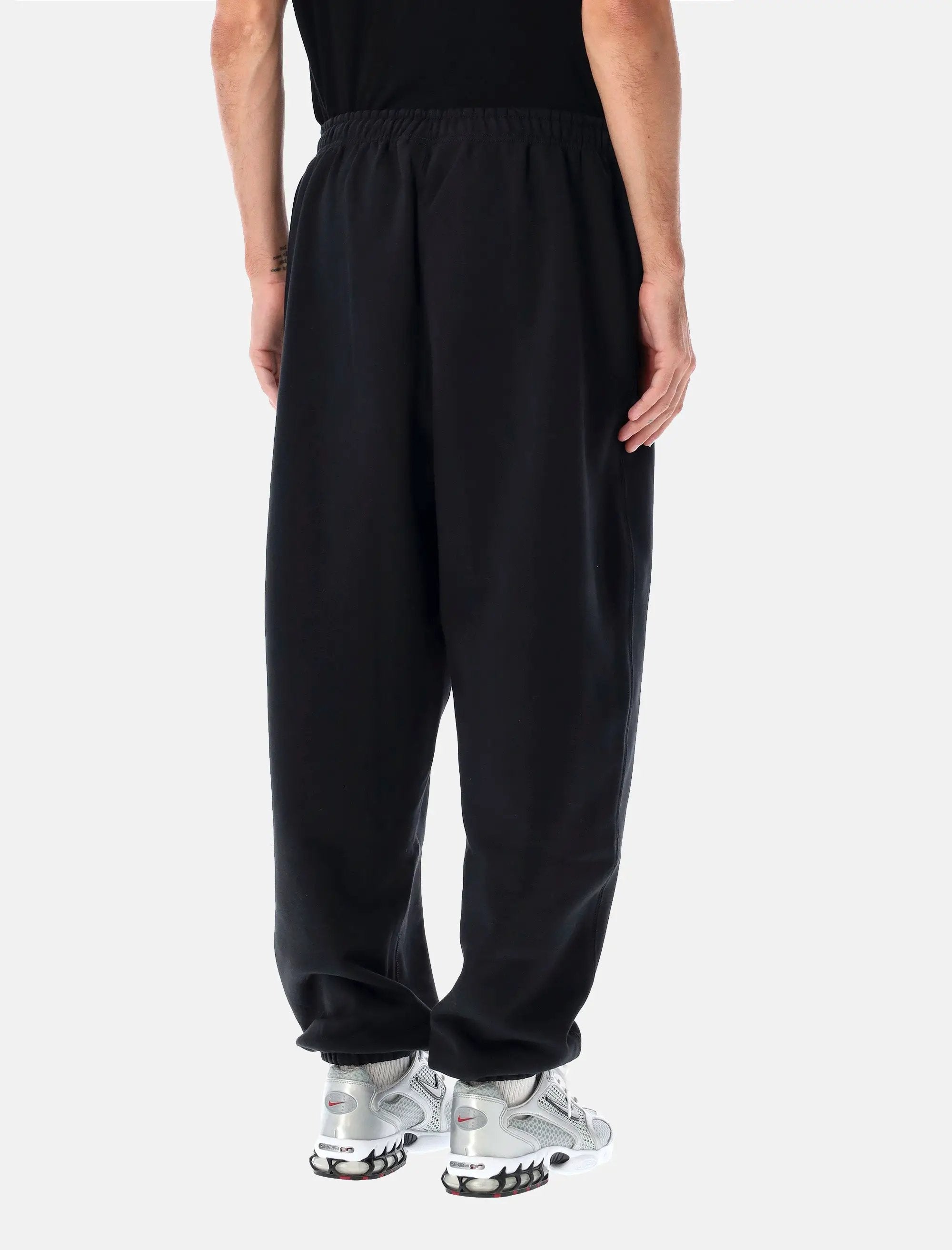 Оригінальна Solo Swoosh Fleece Pants Nike – вид ззаду
