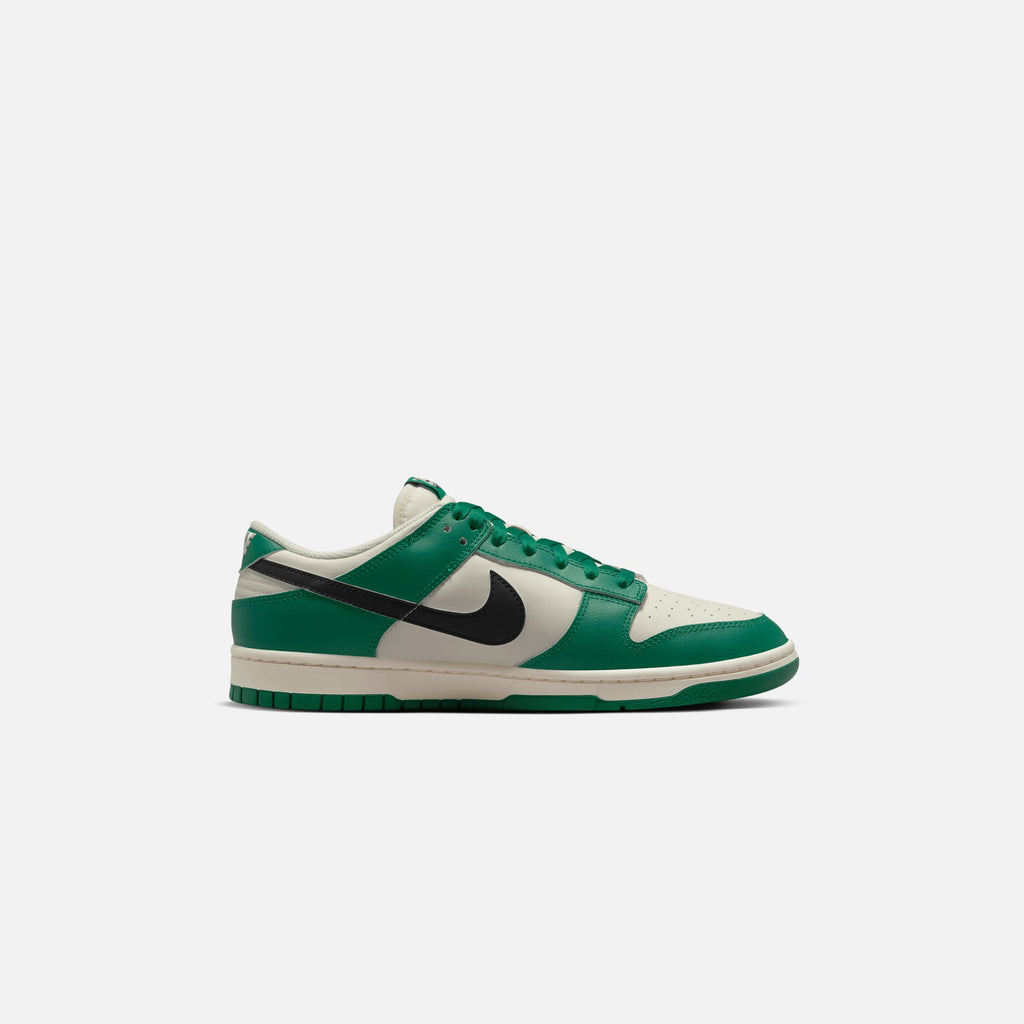 Оригінальна Dunk Low Retro Se Pale Ivory Nike – боковий вид