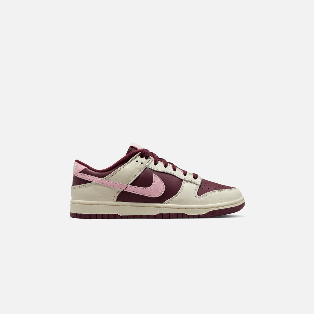 Оригінальна Dunk Low Retro Prm Pale Ivory Nike – боковий вид