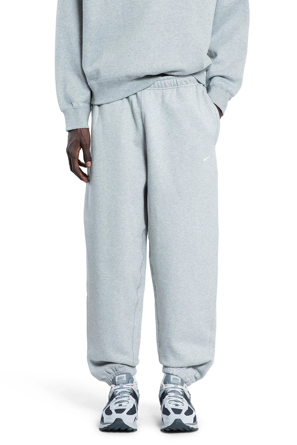 Оригінальна Solo Swoosh Fleece Pants Nike – боковий вид
