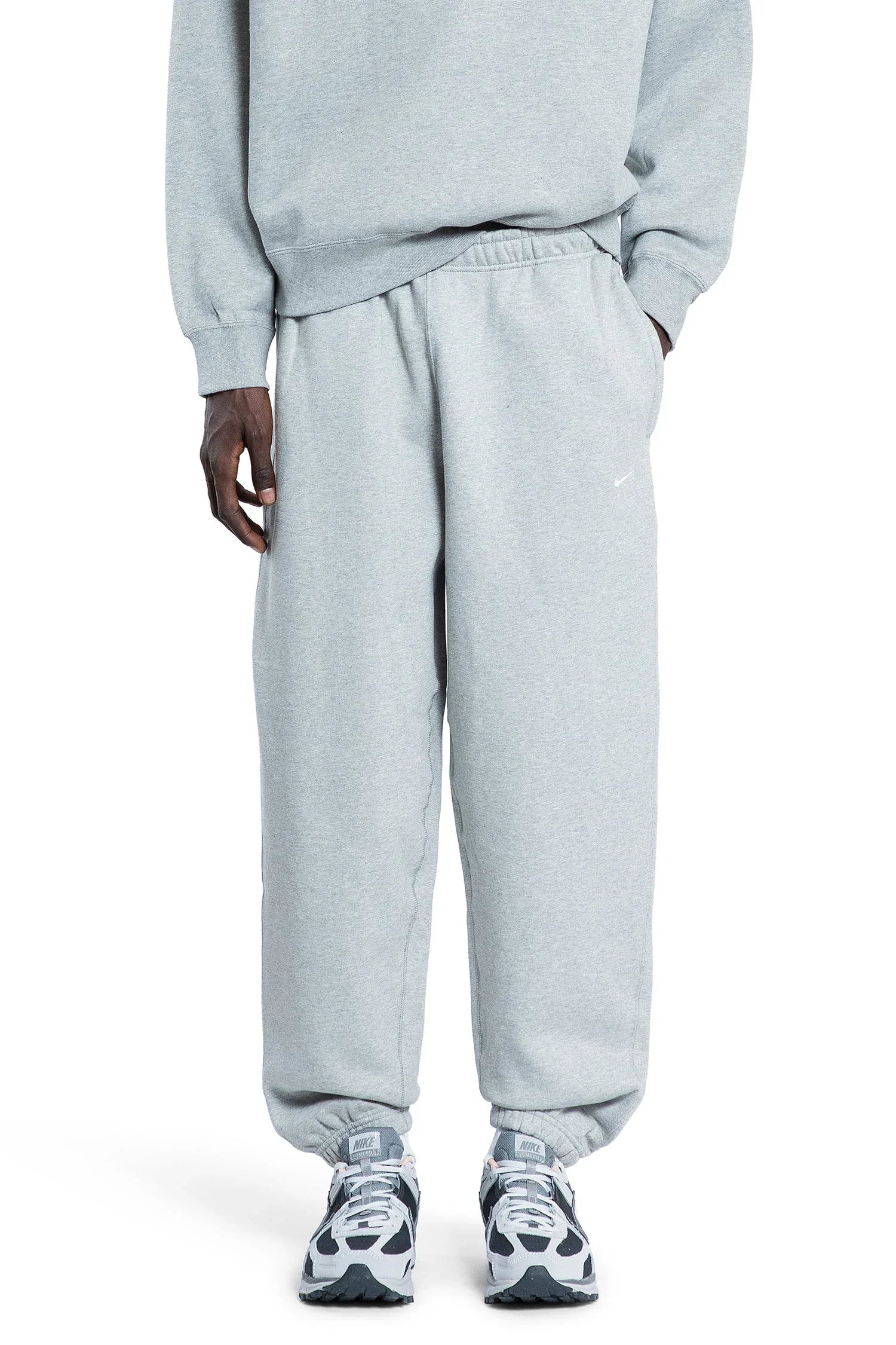 Оригінальна Solo Swoosh Fleece Pants Nike – боковий вид