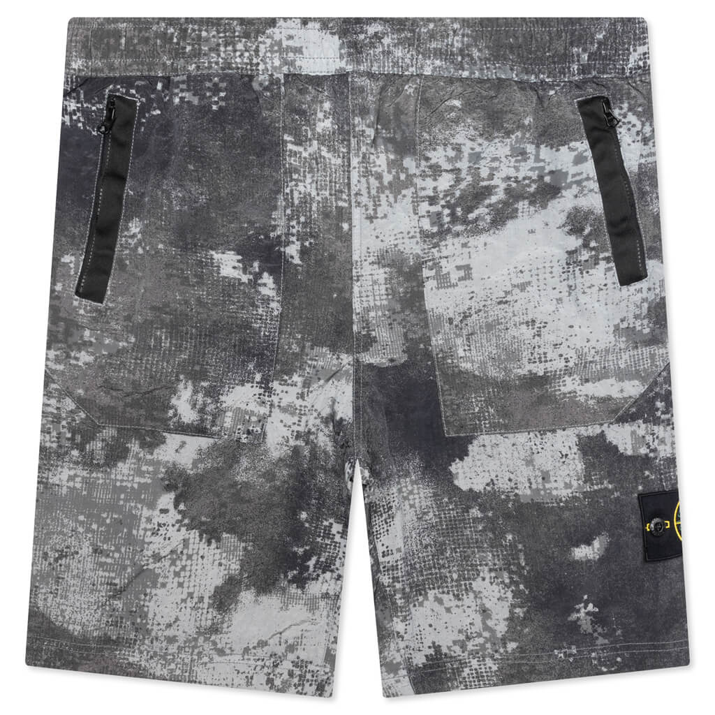Dissolving Grid Camo Comfort Fit Bermuda Shorts Stone island – Гарантія оригінальності – боковий вид