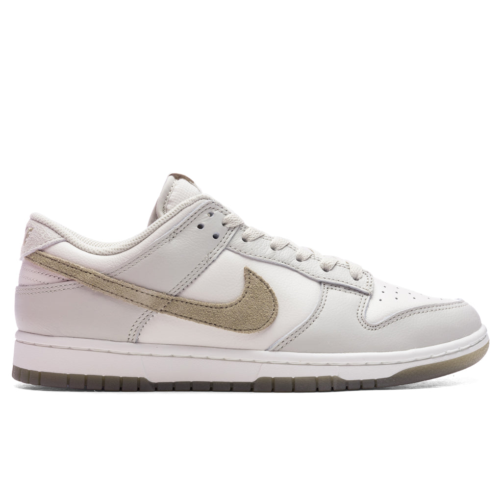 Оригінальна Dunk Low Retro Se Nike – боковий вид