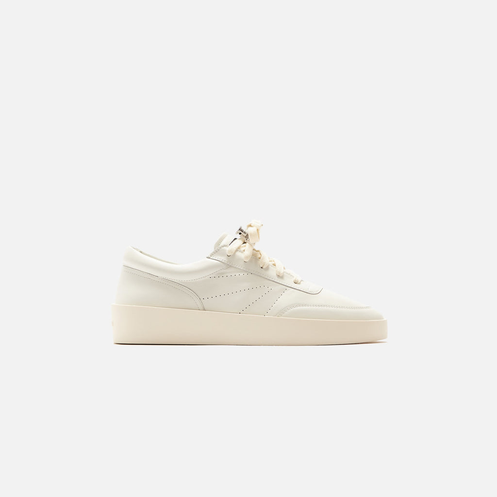 Оригінальна The Tennis Sneaker Flat Leather Cream Fear of god – боковий вид