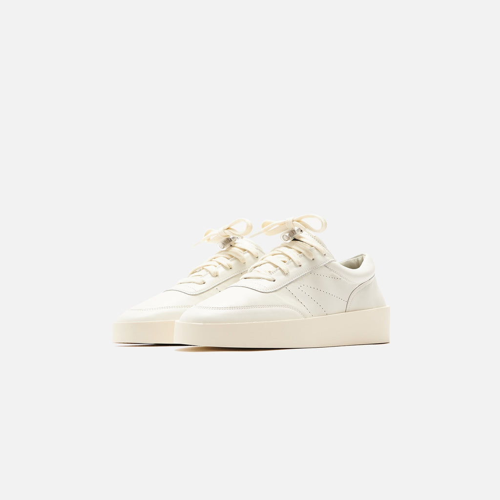 Оригінальна The Tennis Sneaker Flat Leather Cream Fear of god – вид ззаду