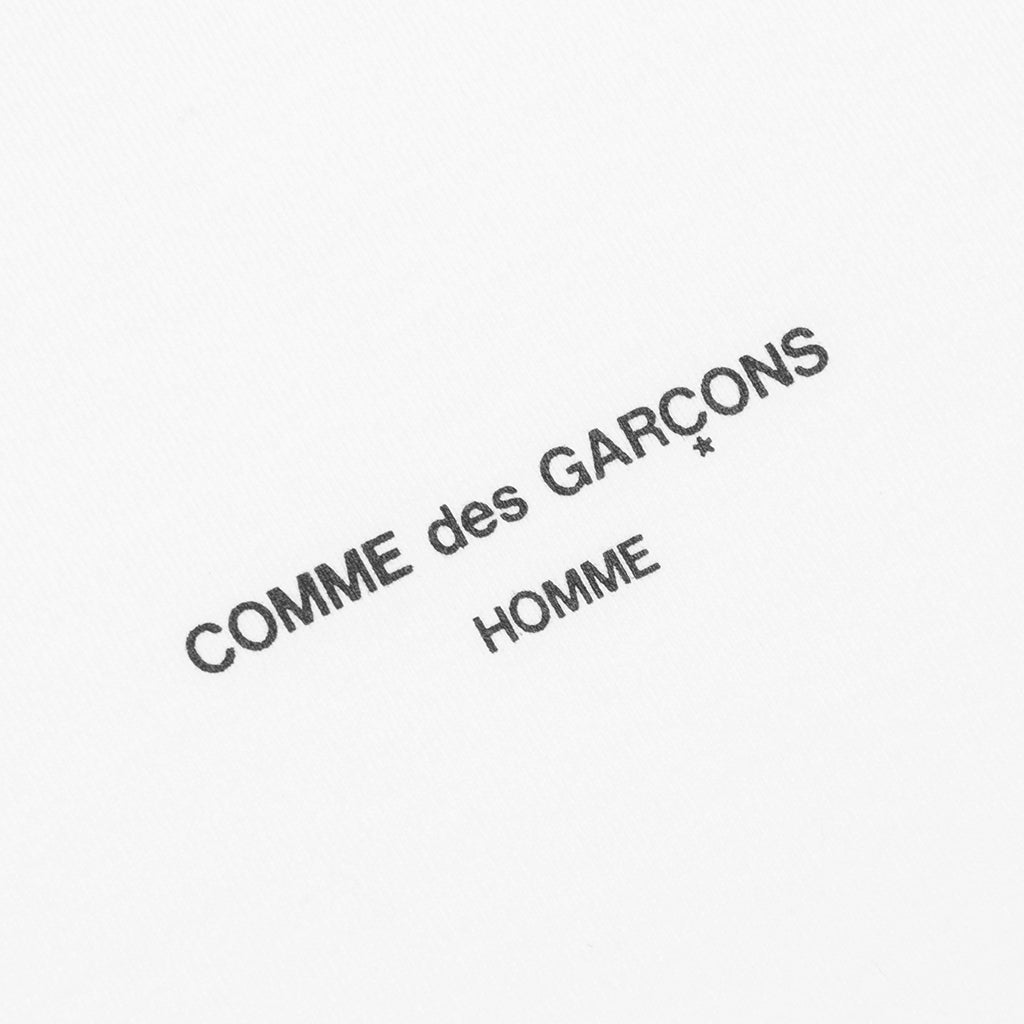 Logo S Comme des garcons – Гарантія оригінальності – детальний вид