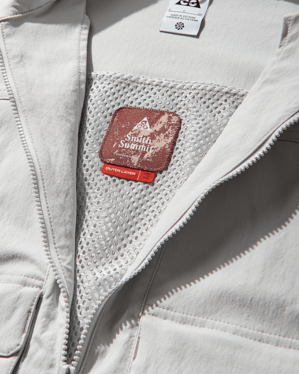 Оригінальна Womens Acg Smith Summituv-Resistant Jacket Photon Dust Nike – детальний вид
