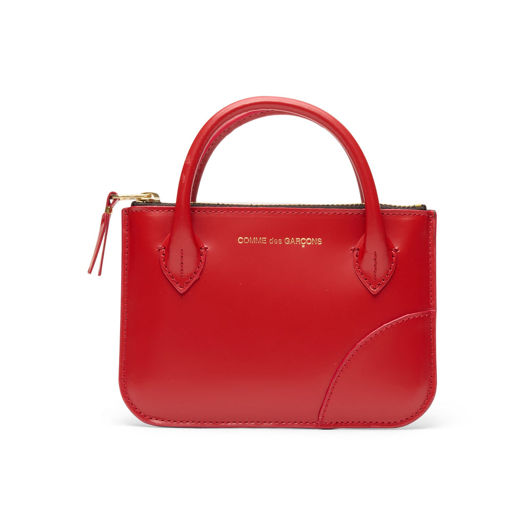 Handles Comme des garcons оригінал – Купити в Україні – боковий вид