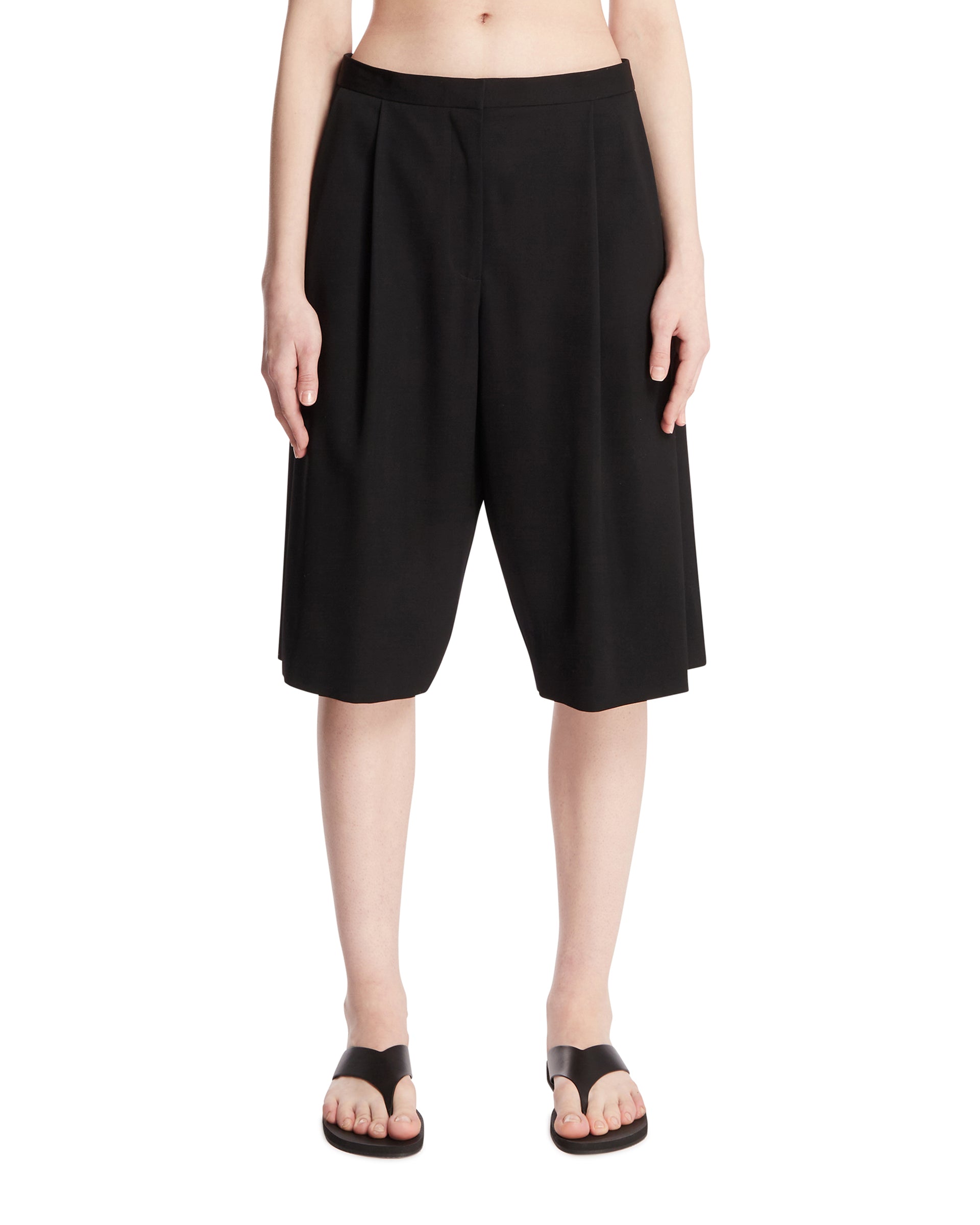 Оригінальна Black Kalyan Wool Shorts The row – боковий вид