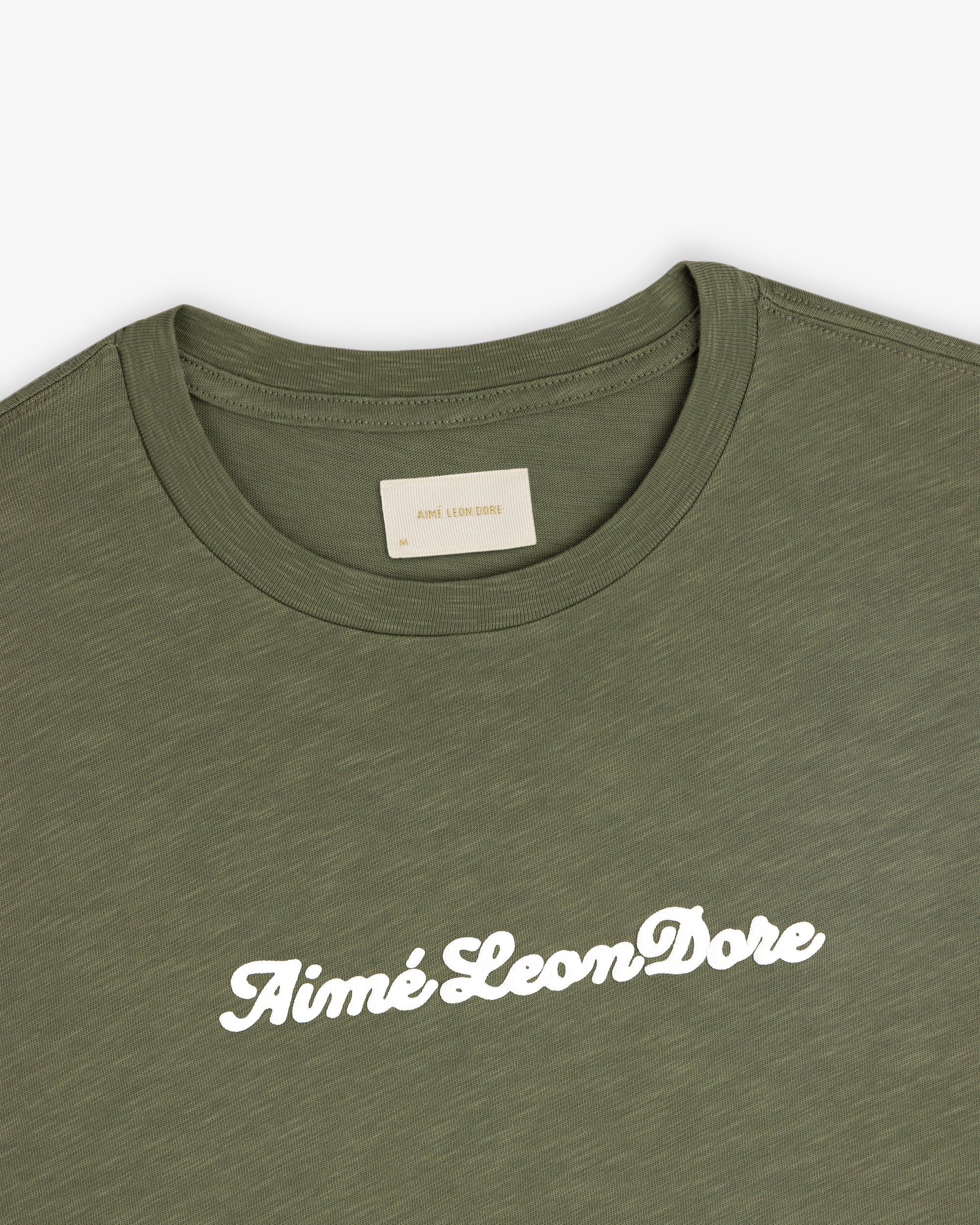 Puff Print Slub Logo Tee Aime leon dore – Гарантія оригінальності – детальний вид