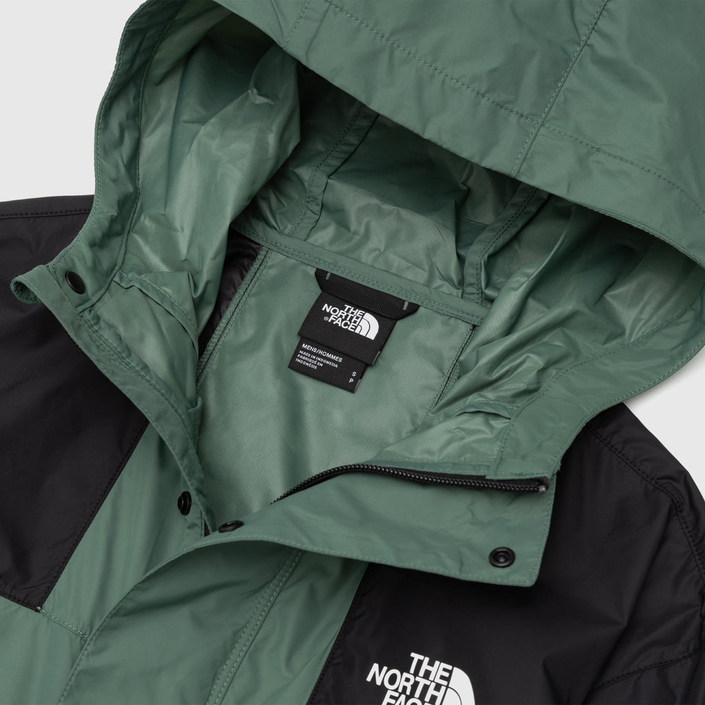 Mountain Wind Jacket The north face – Гарантія оригінальності – вид ззаду