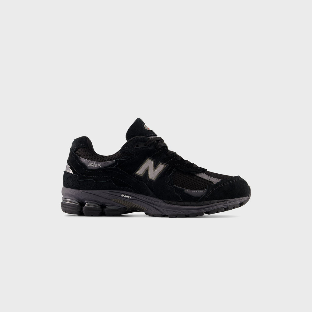 Оригінальна U2002dx Black New balance – боковий вид