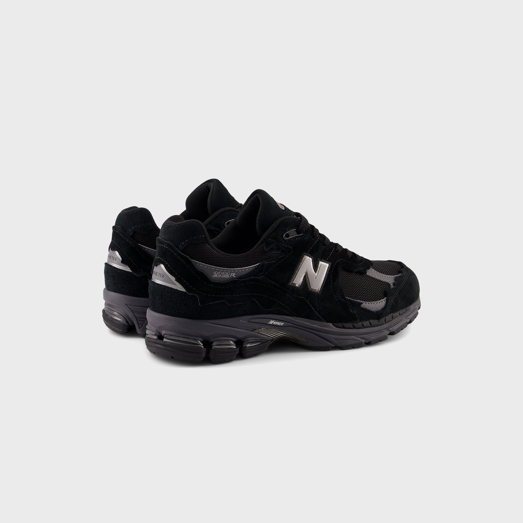 Оригінальна U2002dx Black New balance – вид ззаду