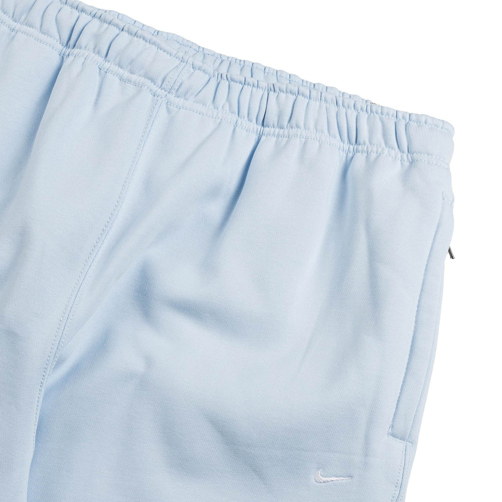 Оригінальна Solo Swoosh Cuffed Fleece Pants Nike – вид ззаду