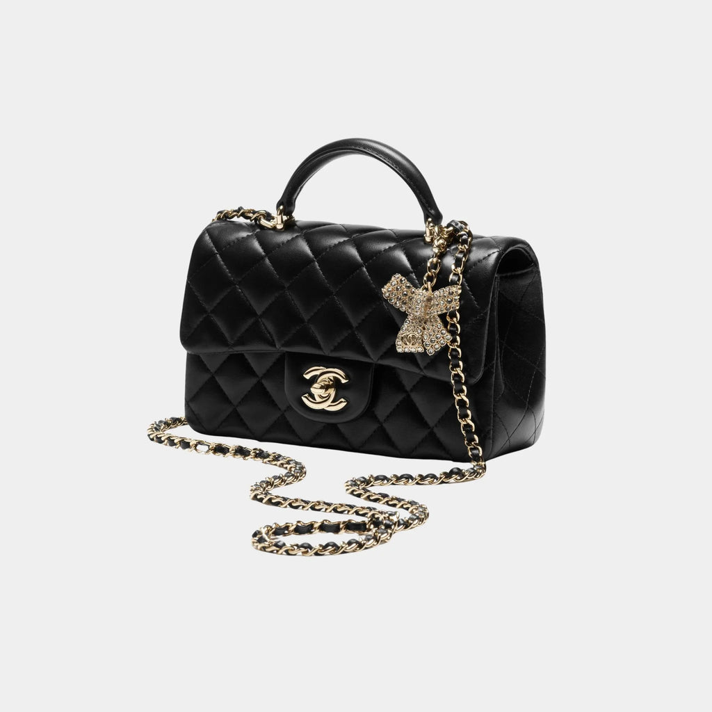 Classic Mini Bag With Handle Lambskin Rhinestones & Gold Metal Black Chanel – Гарантія оригінальності – боковий вид