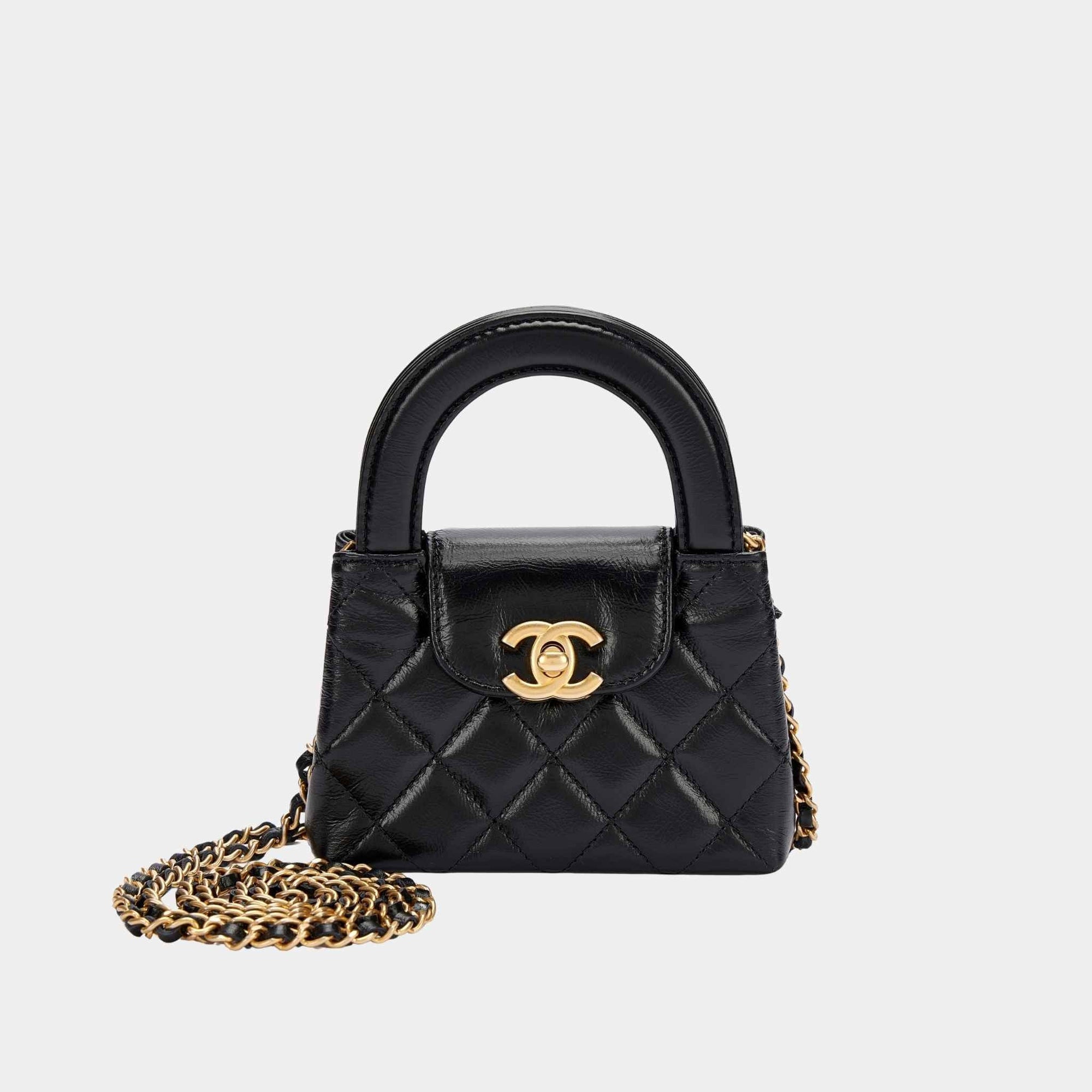 Оригінальна Kelly Micro Aged Calf Black Chanel – боковий вид