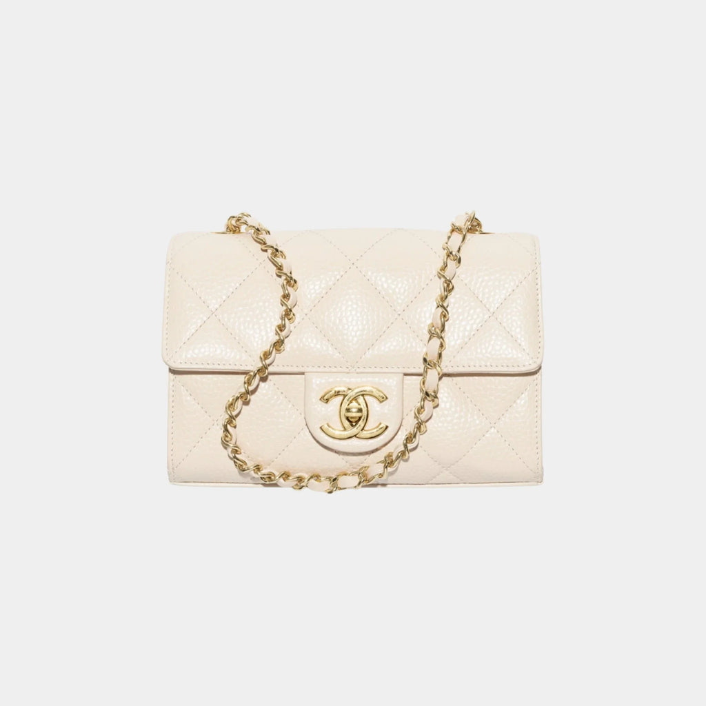 Оригінальна Mini Flap Bag Grained Calfskin & Gold-Tone Metal In Light Beige Chanel – боковий вид