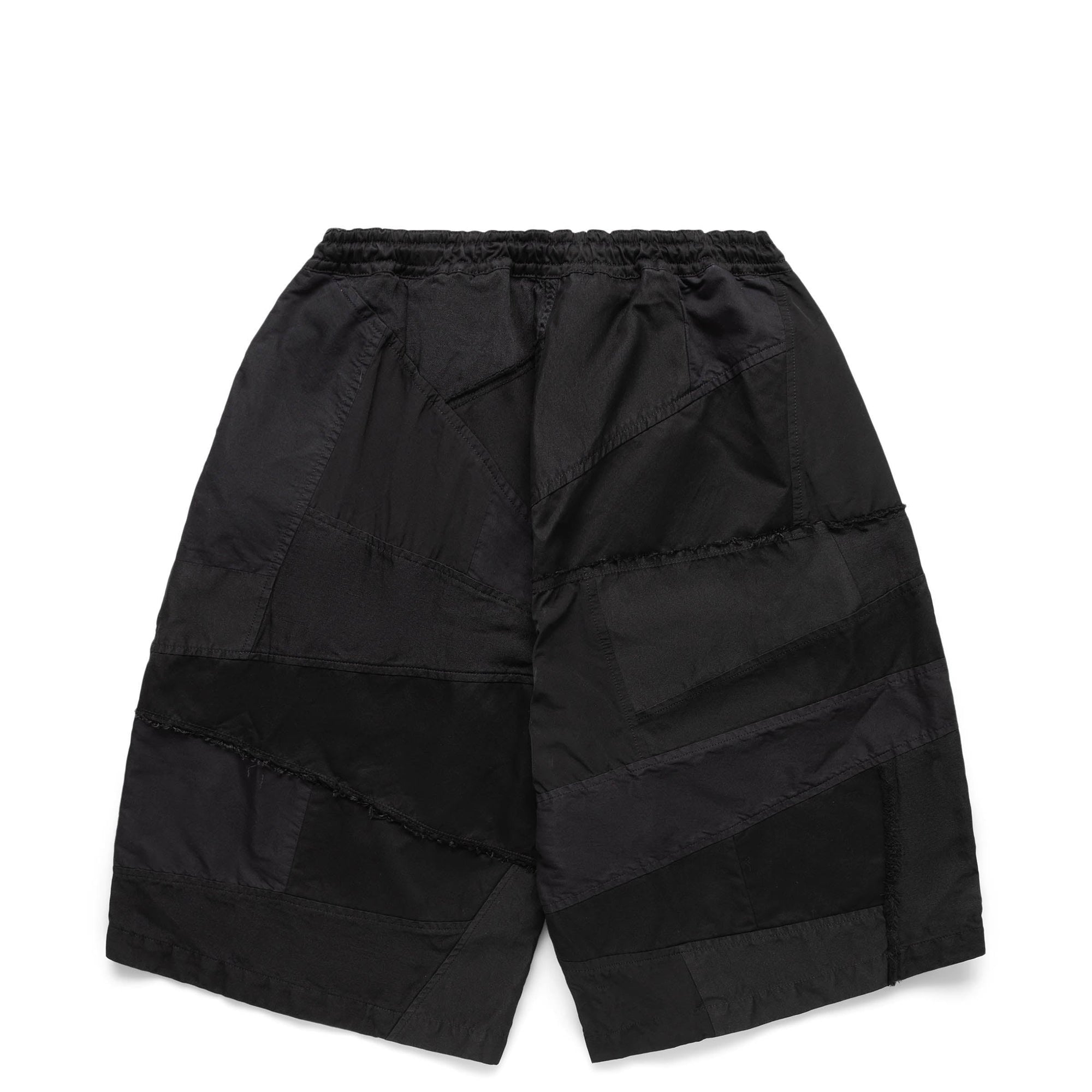 Comme des garcons Bottoms оригінал | Швидка доставка Україна – вид ззаду