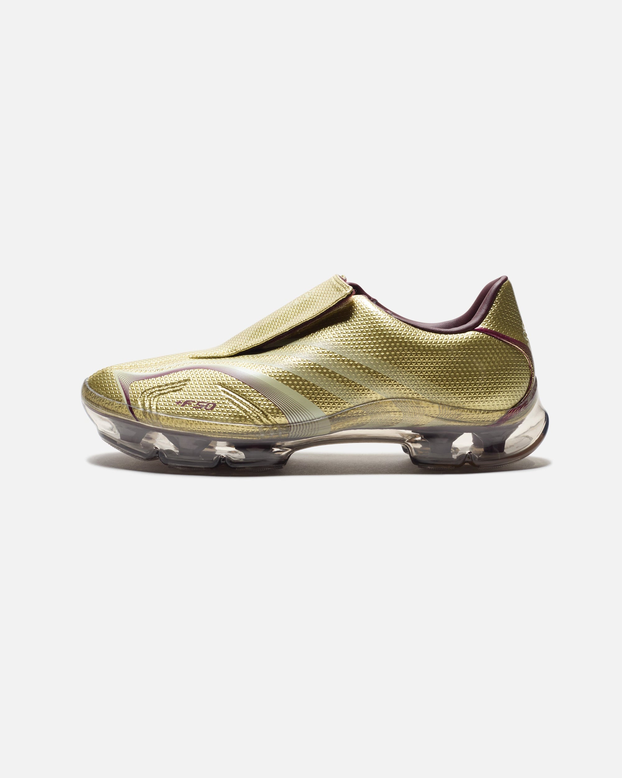 Wmns F50 Adiframe Goldmt Adidas – Гарантія оригінальності – вид ззаду - ADIDAS