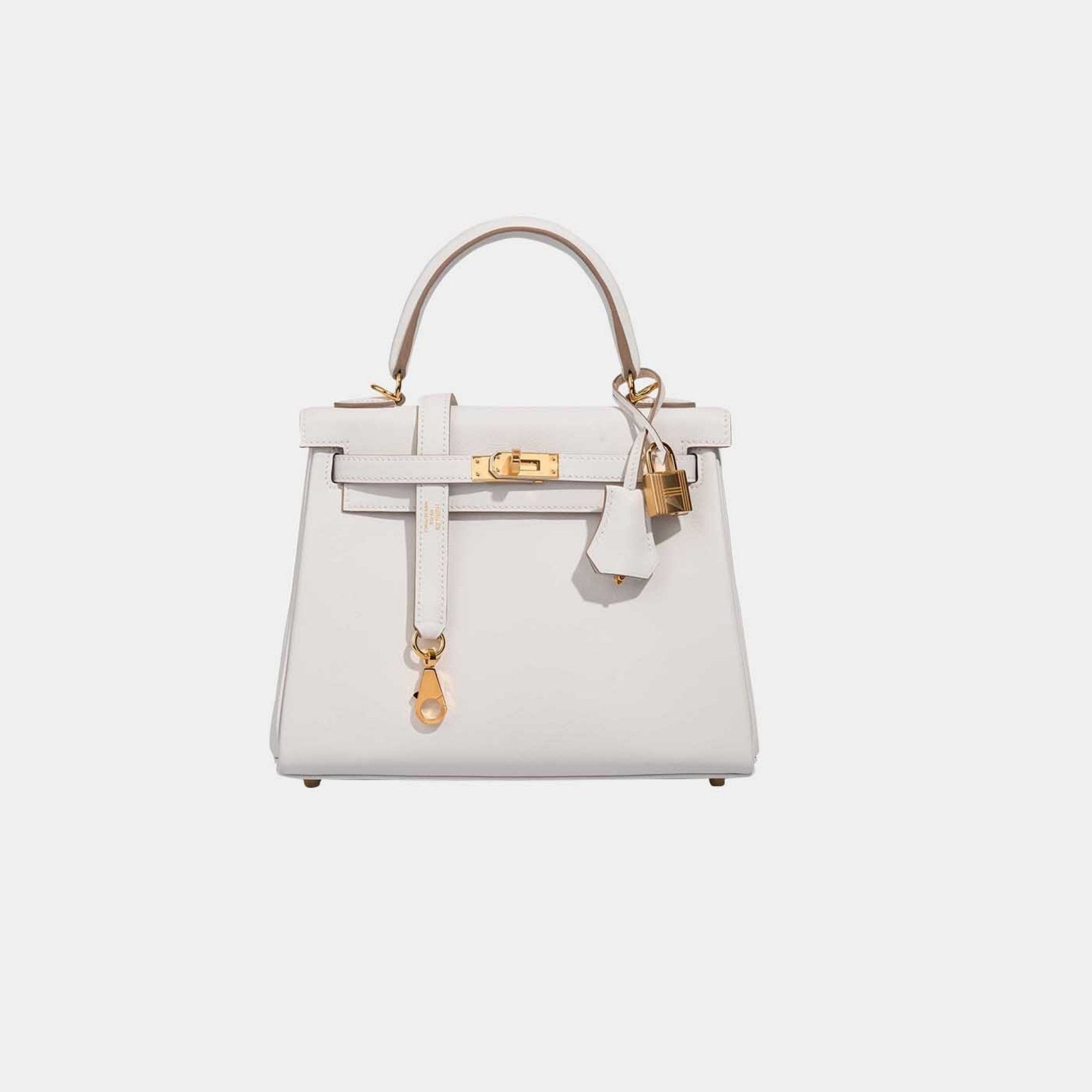Оригінальна Kelly 25 Swift Gris Pale Ghw Hermes – боковий вид