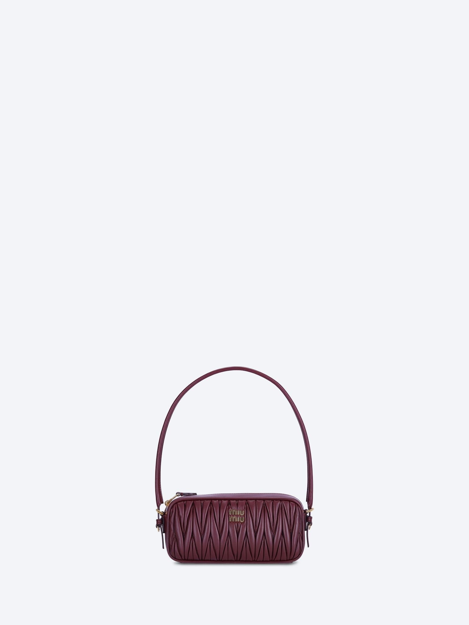 Leather Matelasse Handbag Miu miu – Гарантія оригінальності – боковий вид