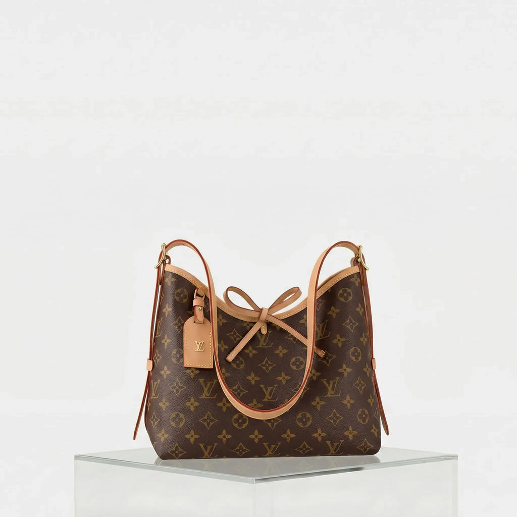 Carryall Pm Bag Monogram Canvas Louis vuitton – Гарантія оригінальності – боковий вид
