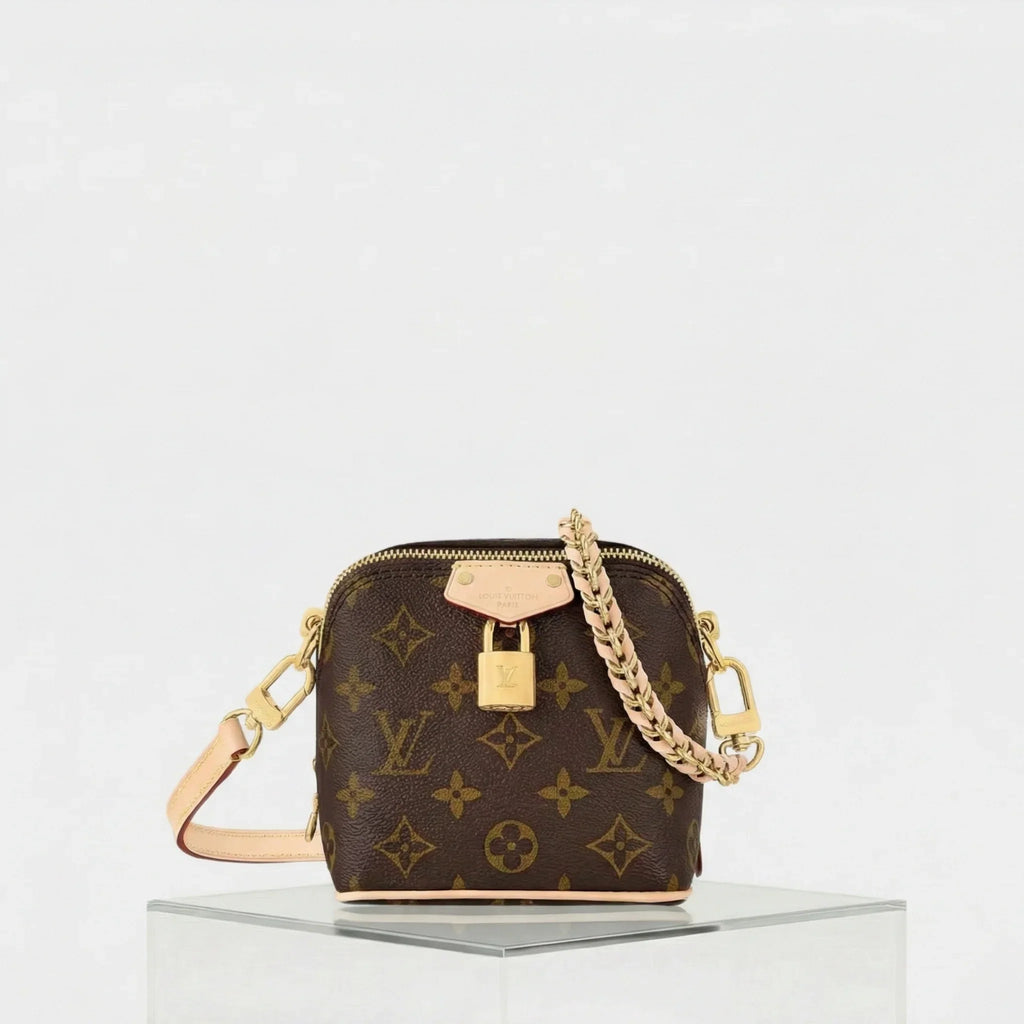 Оригінальна Just In Case Handbag Monogram Canvas Louis vuitton – боковий вид