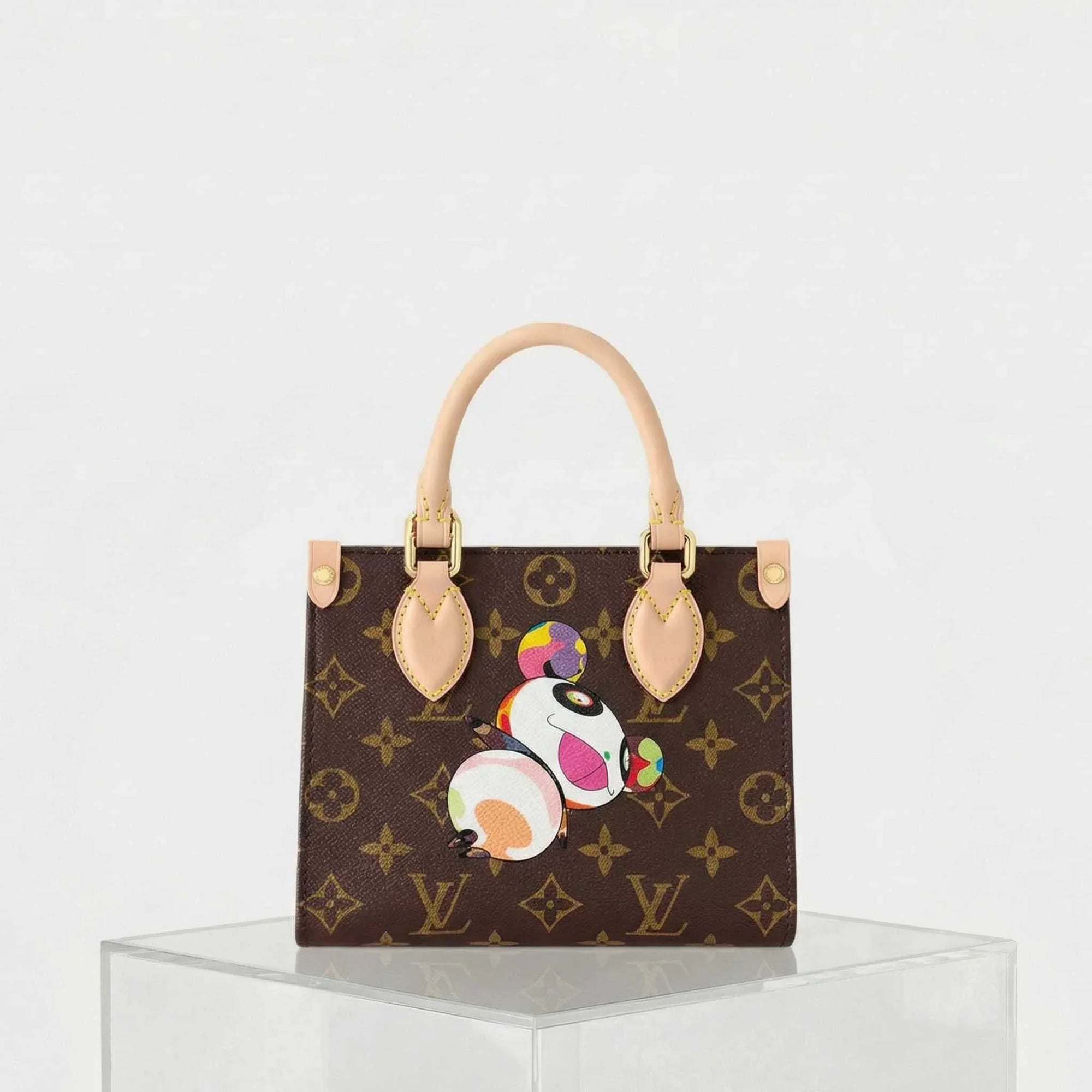 LV X Tm Onthego Bb Handbag Bijou Edition Louis vuitton – Гарантія оригінальності – боковий вид