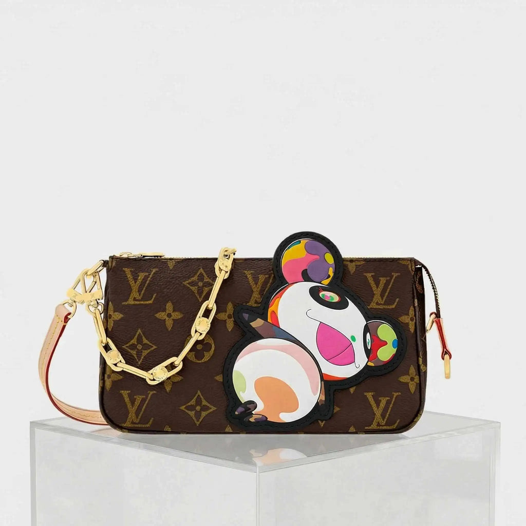Оригінальна LV X Tm Pochette Accessoires Monogram Handbag Louis vuitton – боковий вид