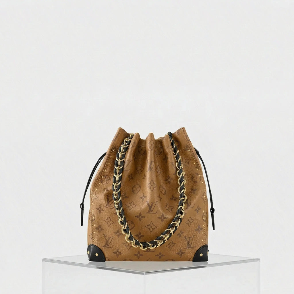 Noé Trunk Pm Monogram Reverse Cruise 2025 Louis vuitton – Гарантія оригінальності – боковий вид