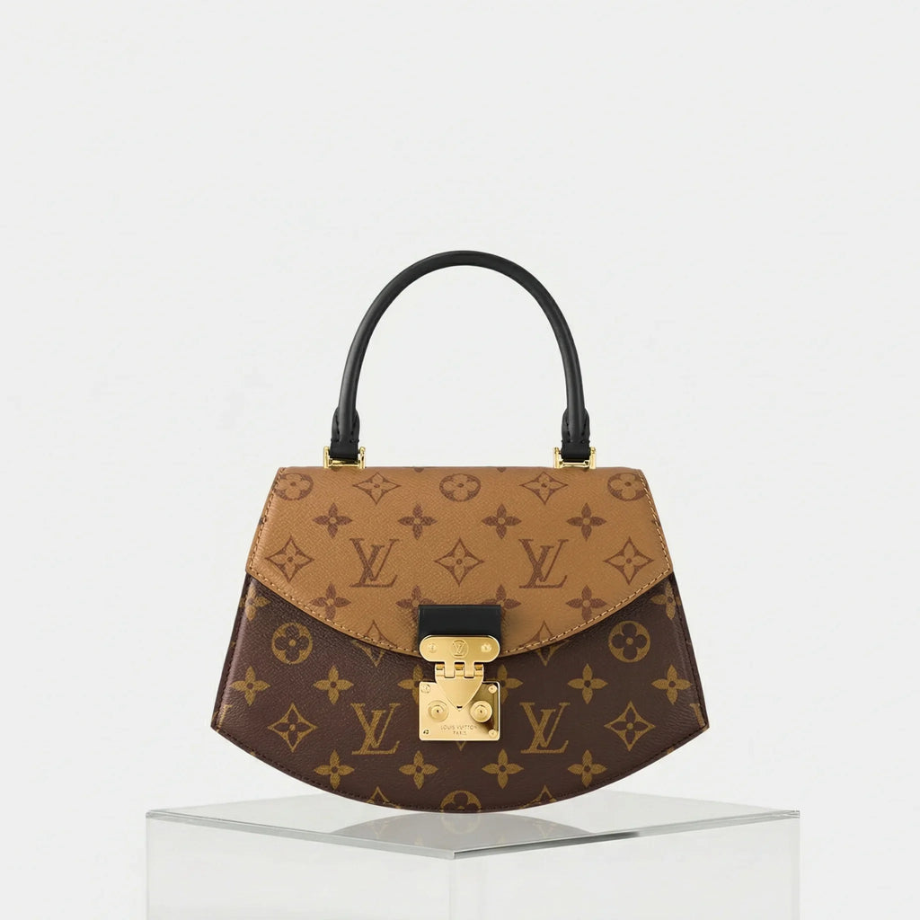 Оригінальна Tilsitt Handbag Monogram And Monogram Reverse Coated Canvas Louis vuitton – боковий вид