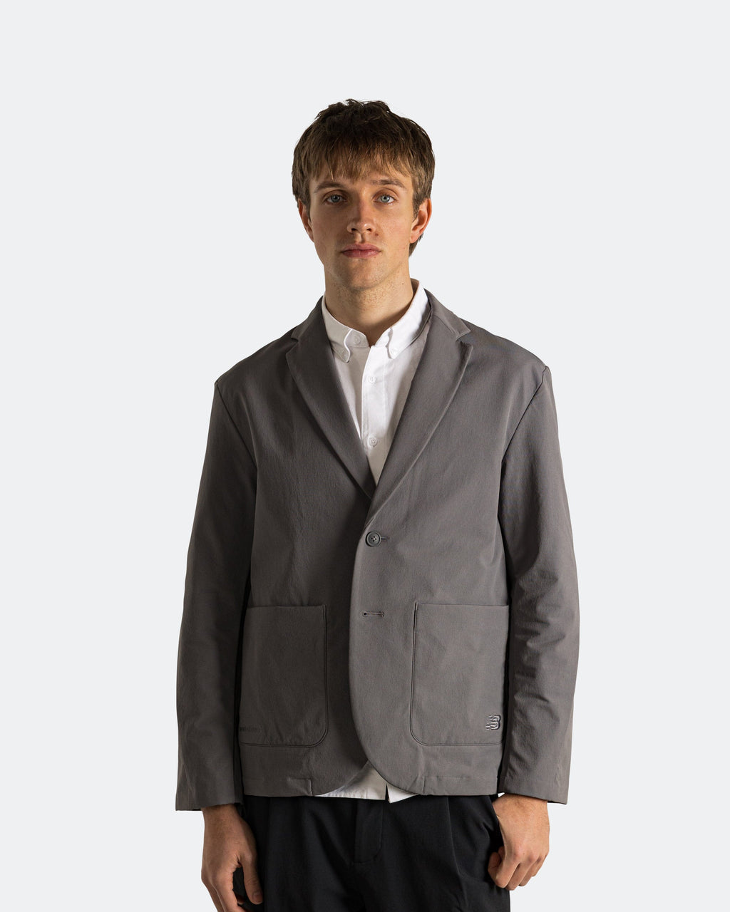 Оригінальна Single Jacket New balance – вид ззаду