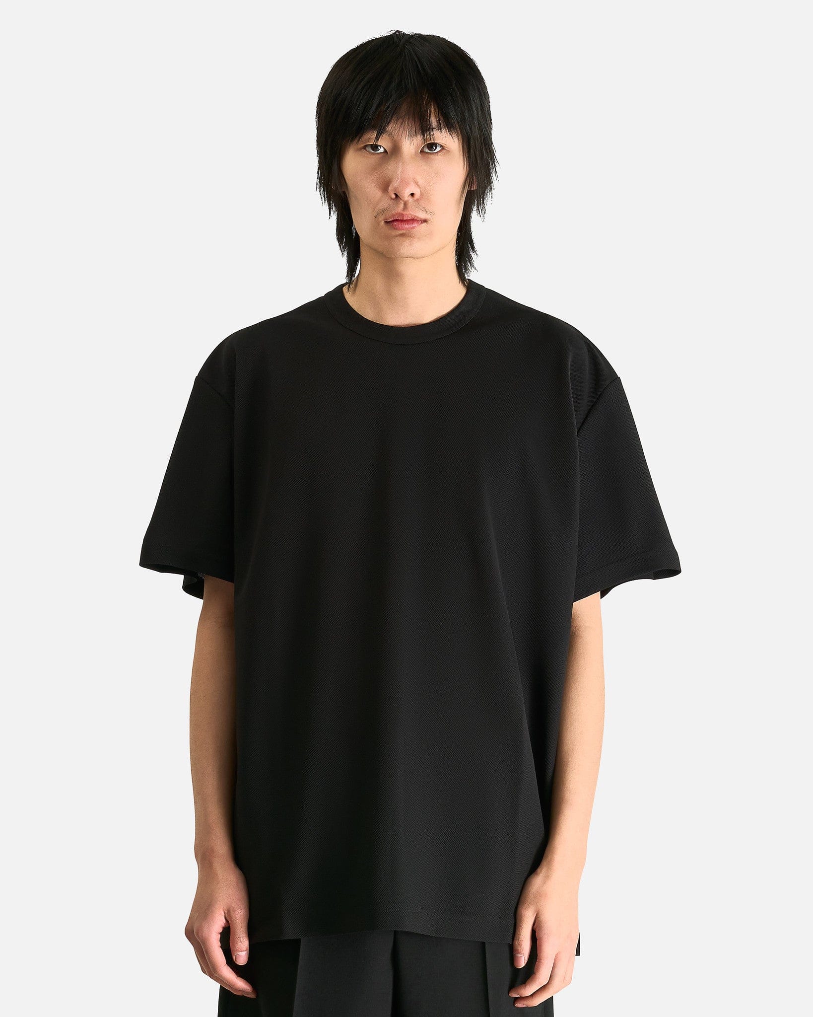 Оригінальна T-Shirt In Black Comme des garcons – боковий вид